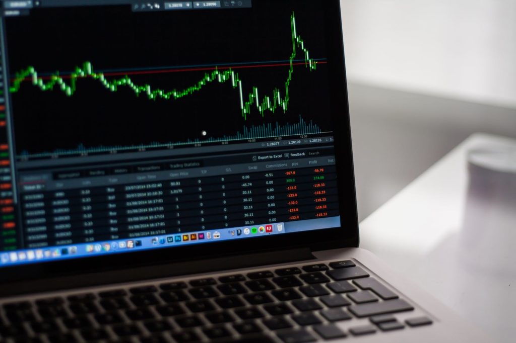 black laptop computer showing stock graph 1024x682 - 5 Steps to Start Your Forex Trading Career