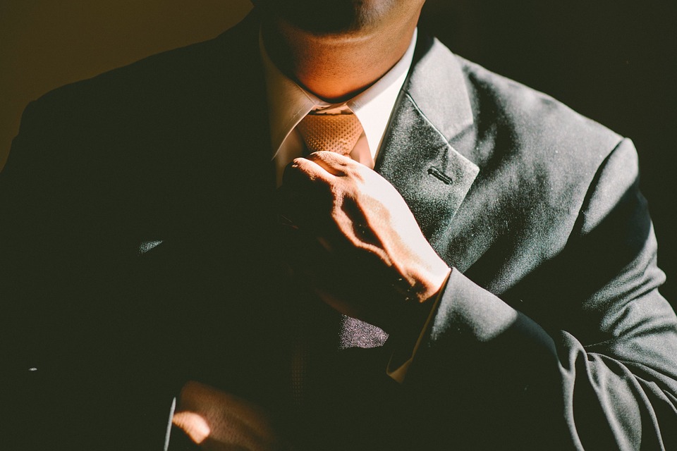 tie necktie adjust adjusting man - 5 Steps to Start Your Forex Trading Career